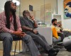 Pan African American Alumni center members gather and in the center and discuss the details of the incident that occured on Labor Day